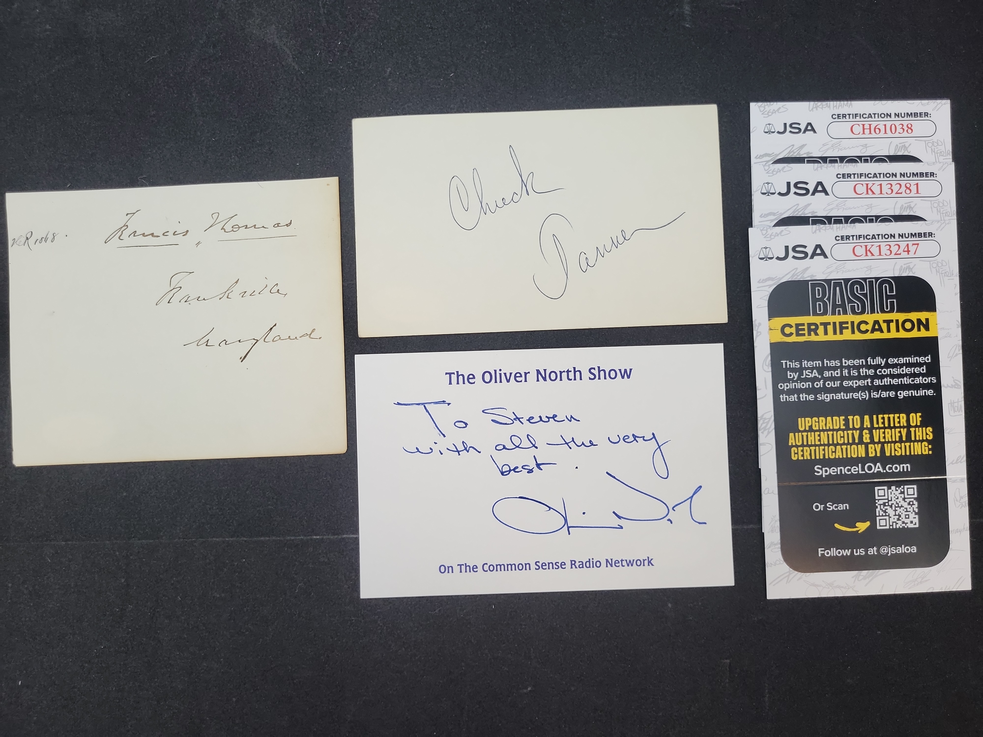 I03371 | A Trio of Authenticated Autographs including Francis Thomas, Chuck Tanner, and Oliver North with JSA Certification