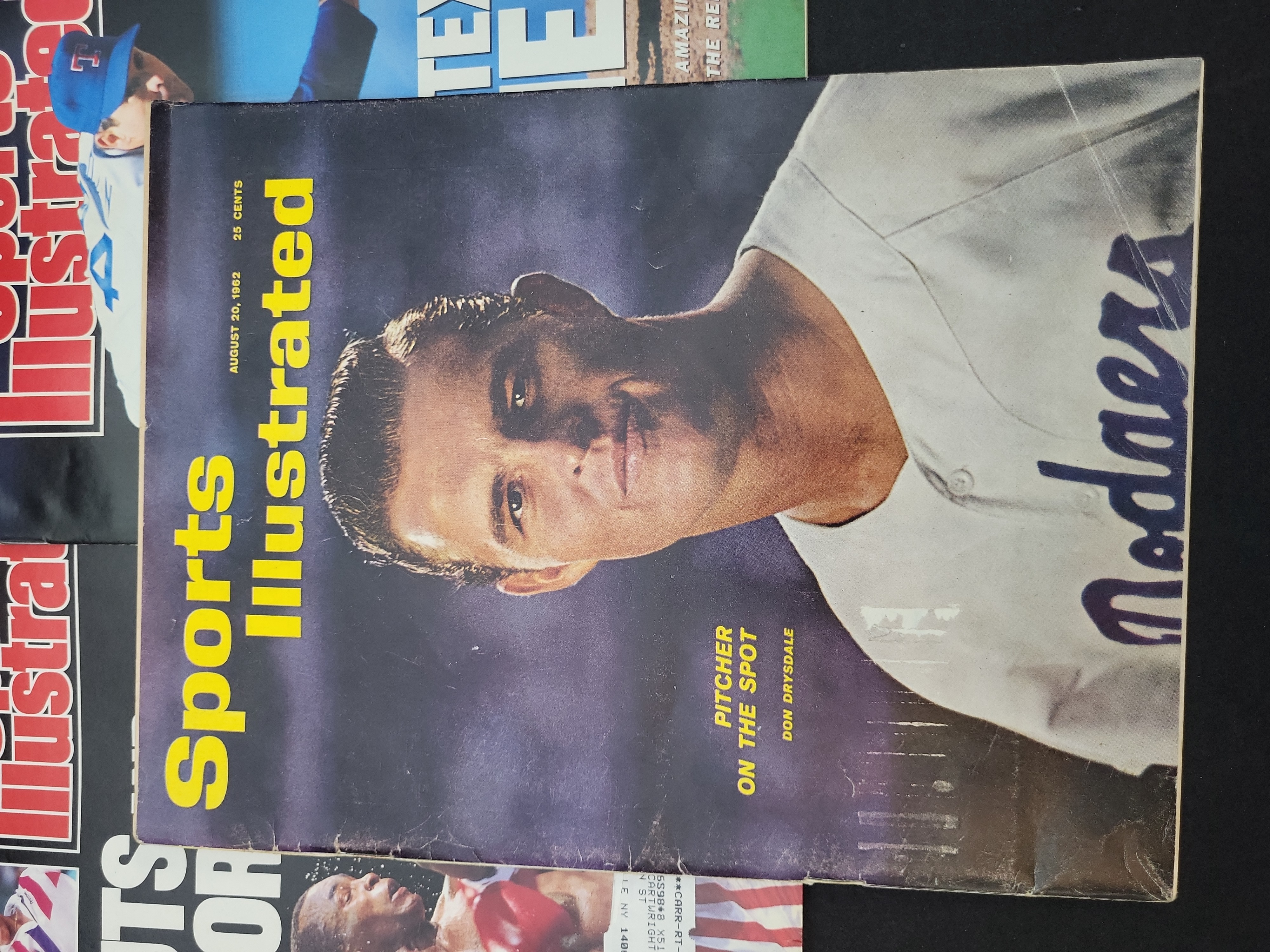 I03866 | A Collection of 35 Sports Illustrated Magazines 1962-2014