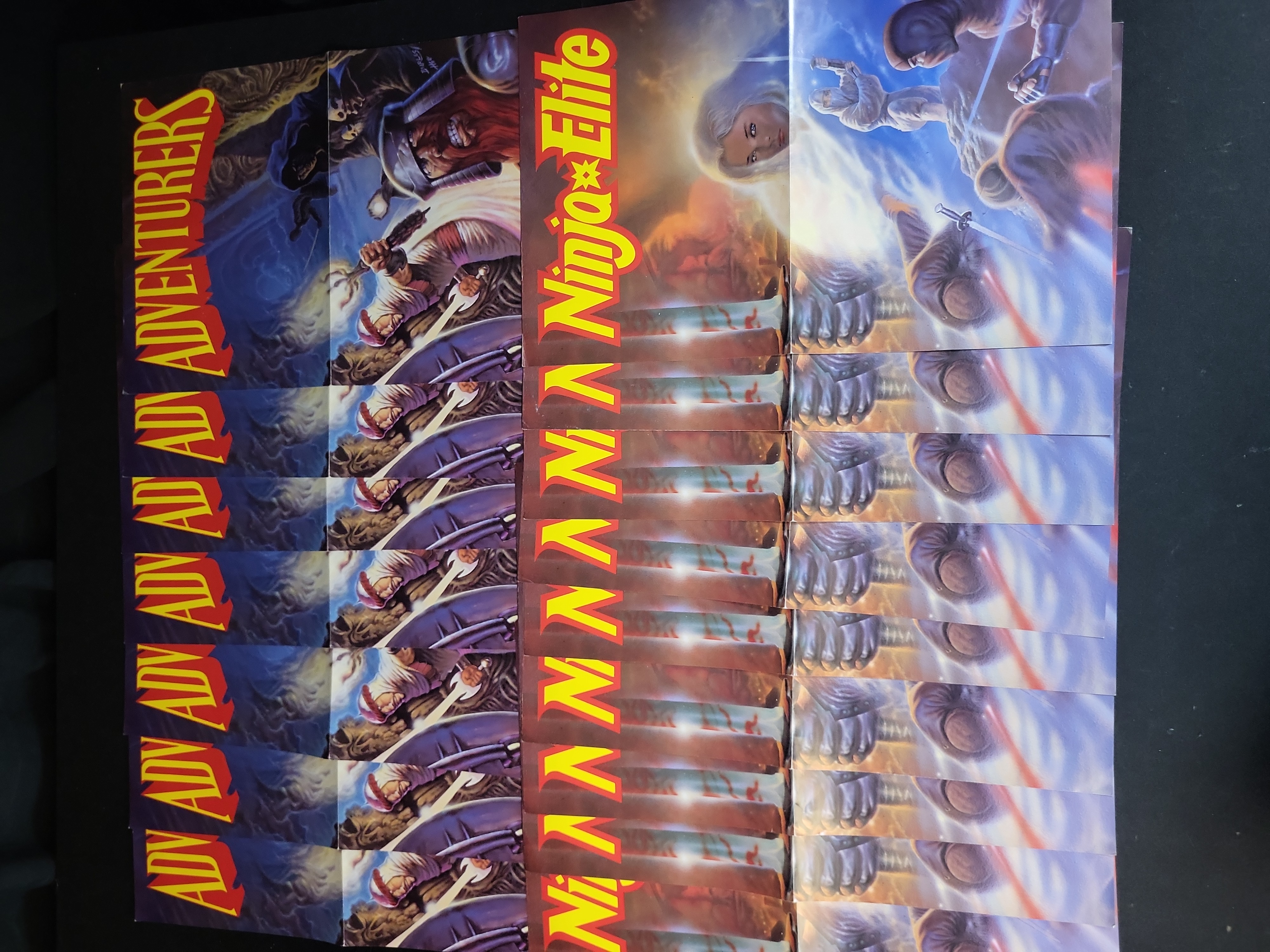 I03898 | A Collection of roughly 20 Adventurers and Ninja Elite Comic Book Cover Production Proofs