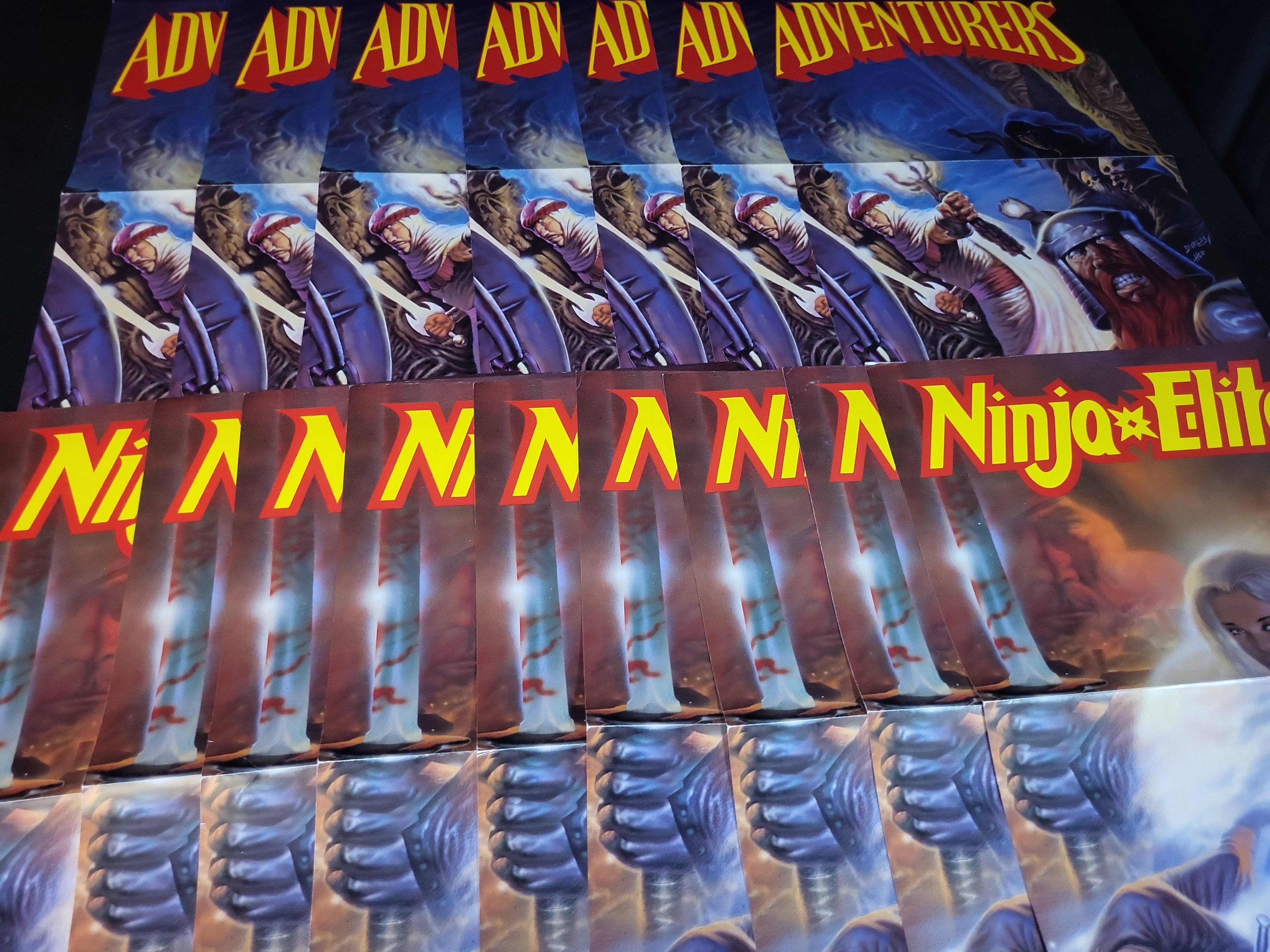 I03898 | A Collection of roughly 20 Adventurers and Ninja Elite Comic Book Cover Production Proofs