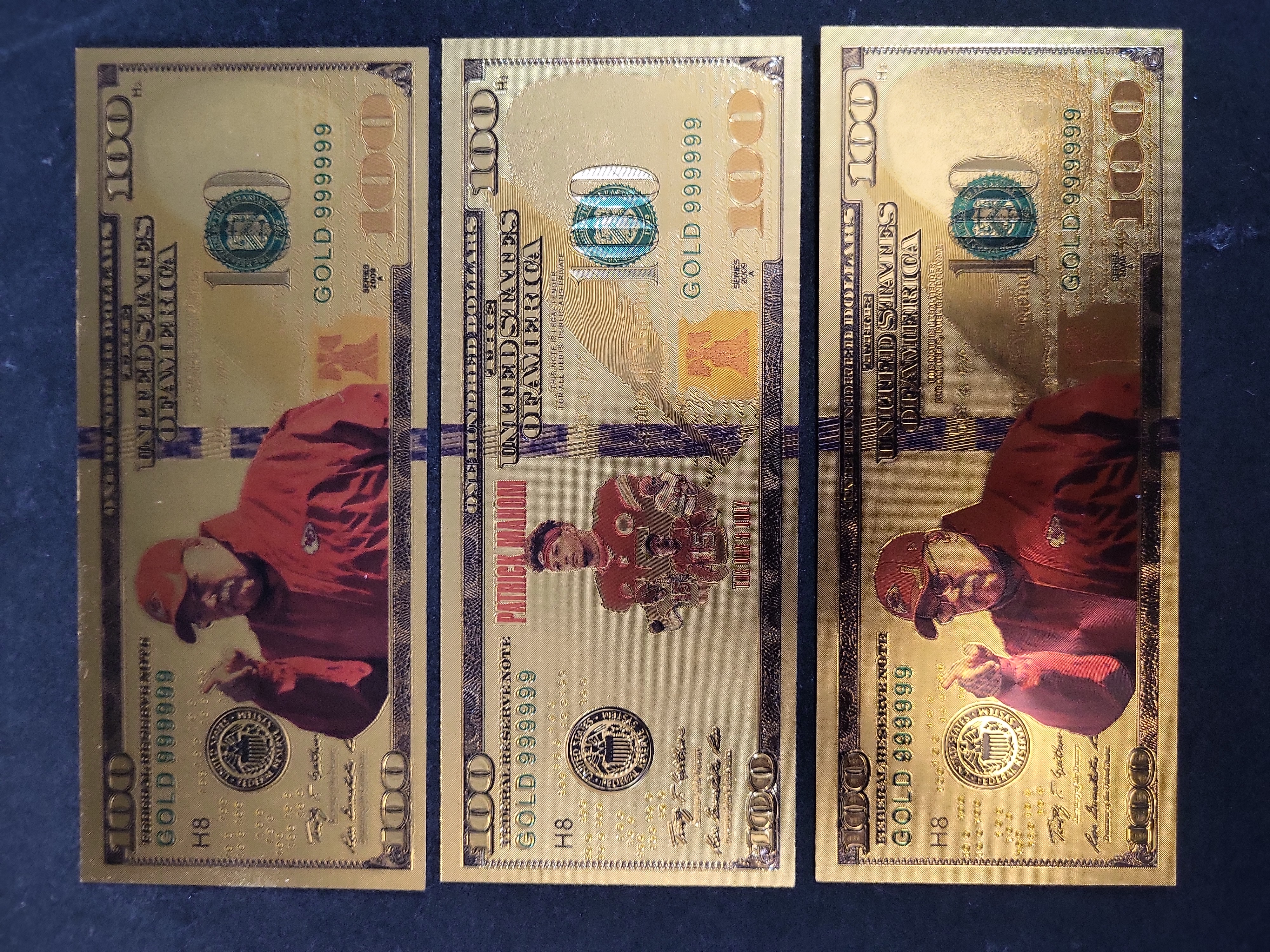 I03654 | A Trio of Kansas City Chiefs Gold Foil Novelty Banknotes Featuring Patrick Mahomes and Travis Kelce