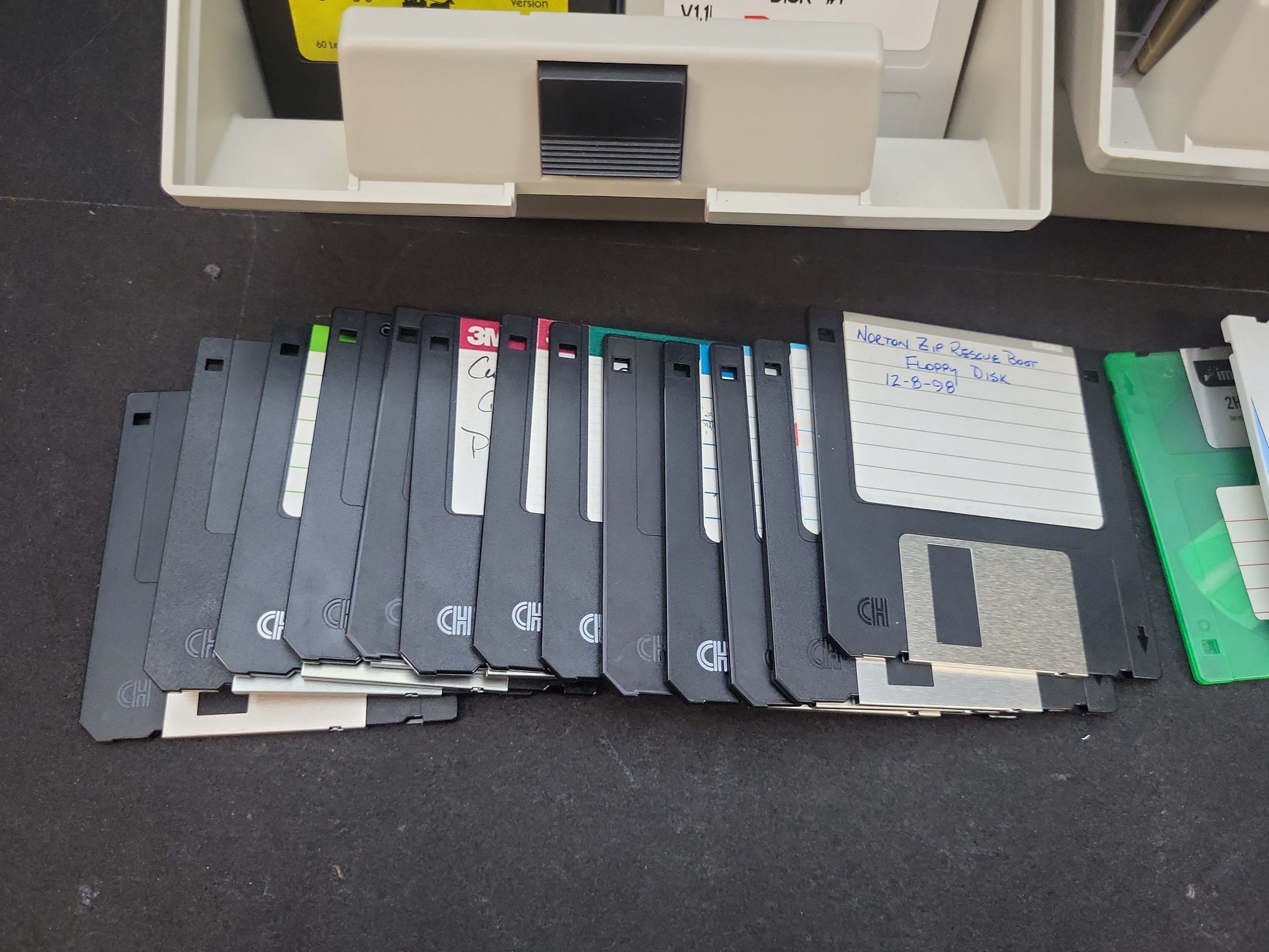 I03865 | An Assortment of Approximately 100+ Vintage 3.5-inch Floppy Diskettes and Storage Cases