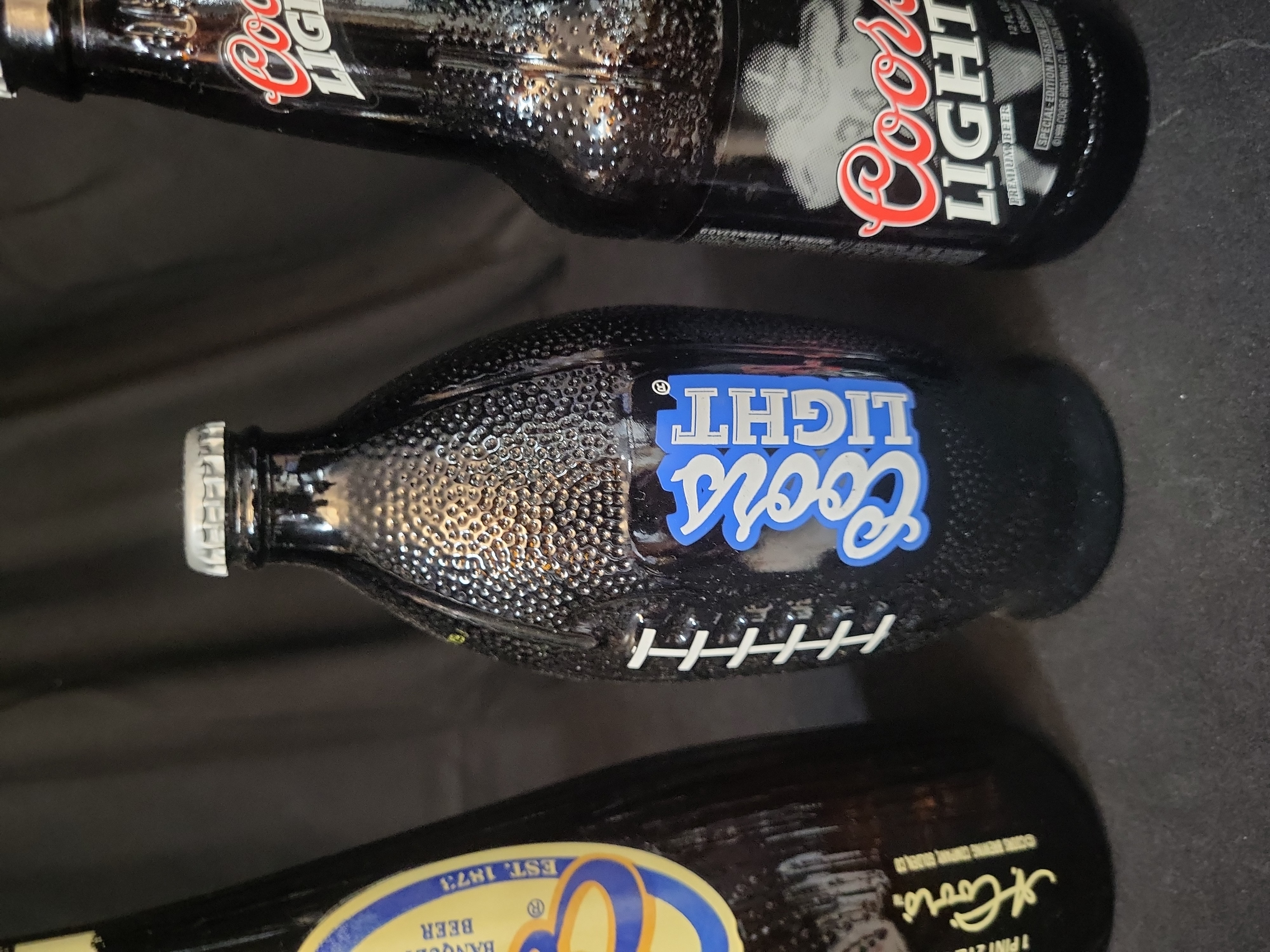 I03053 | A Trio of Coors Brewing Company Commemorative Sports Themed Specialty Bottles