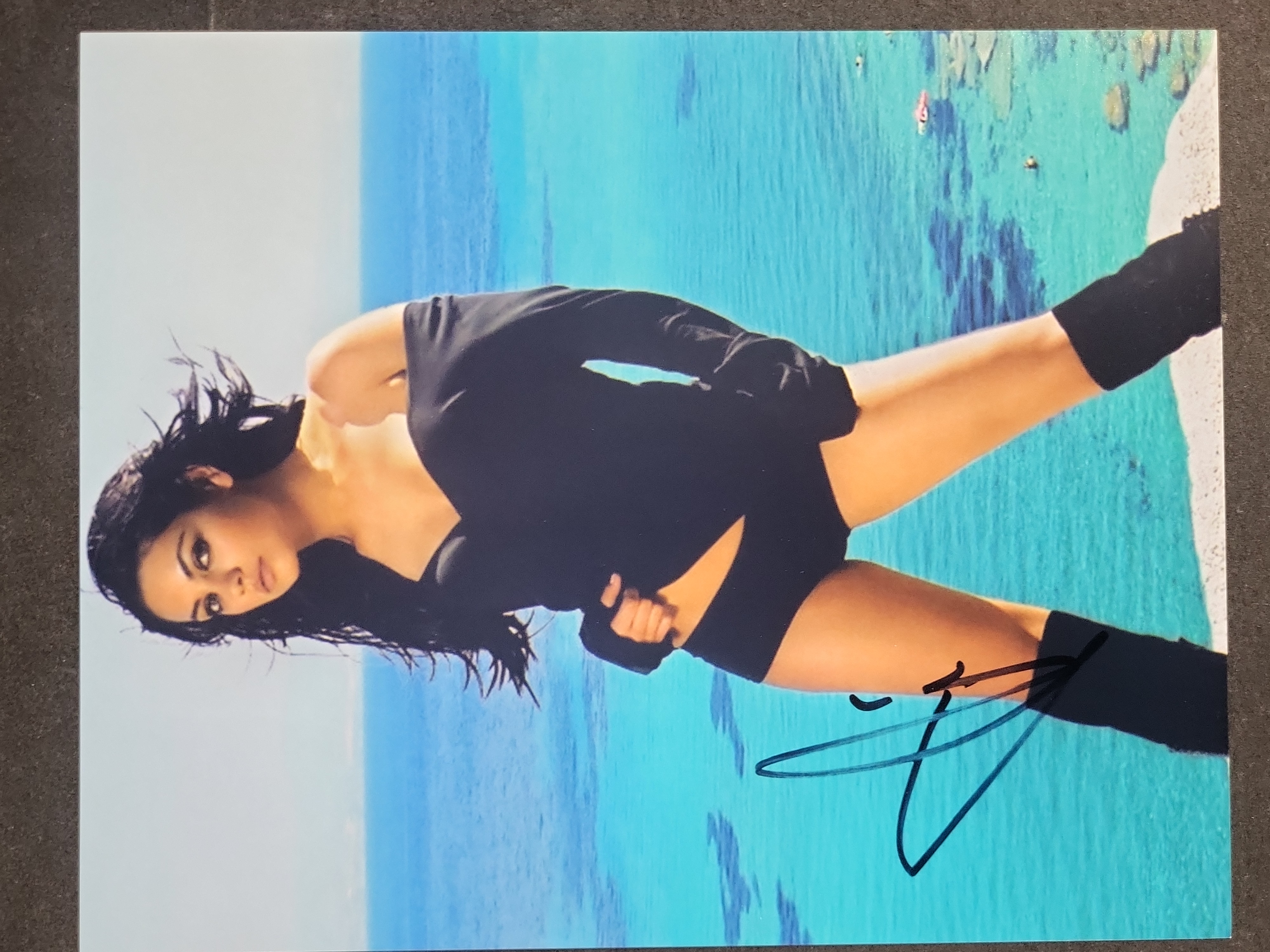 I04410 | Mila Kunis Autographed Color Photograph