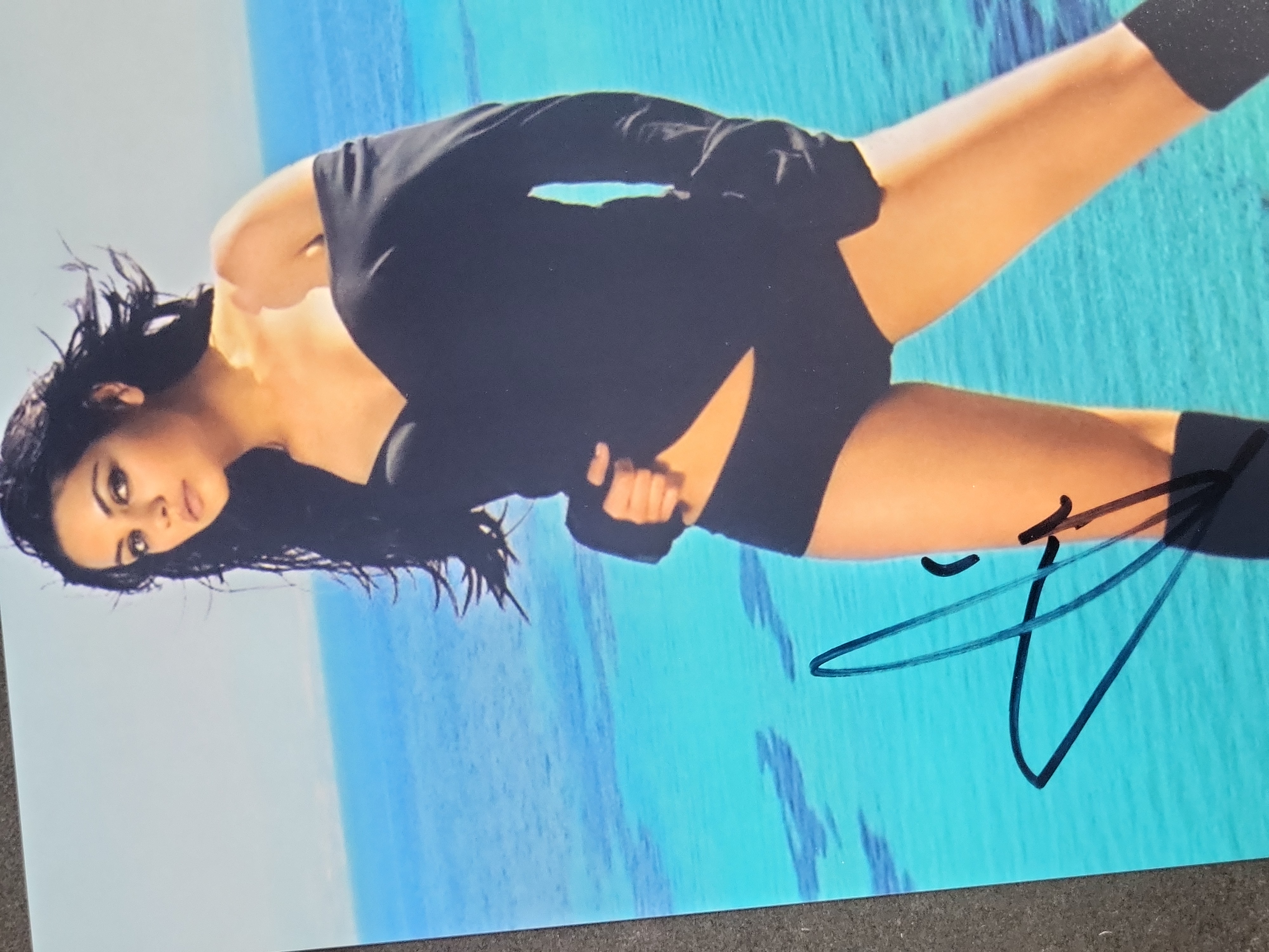 I04410 | Mila Kunis Autographed Color Photograph