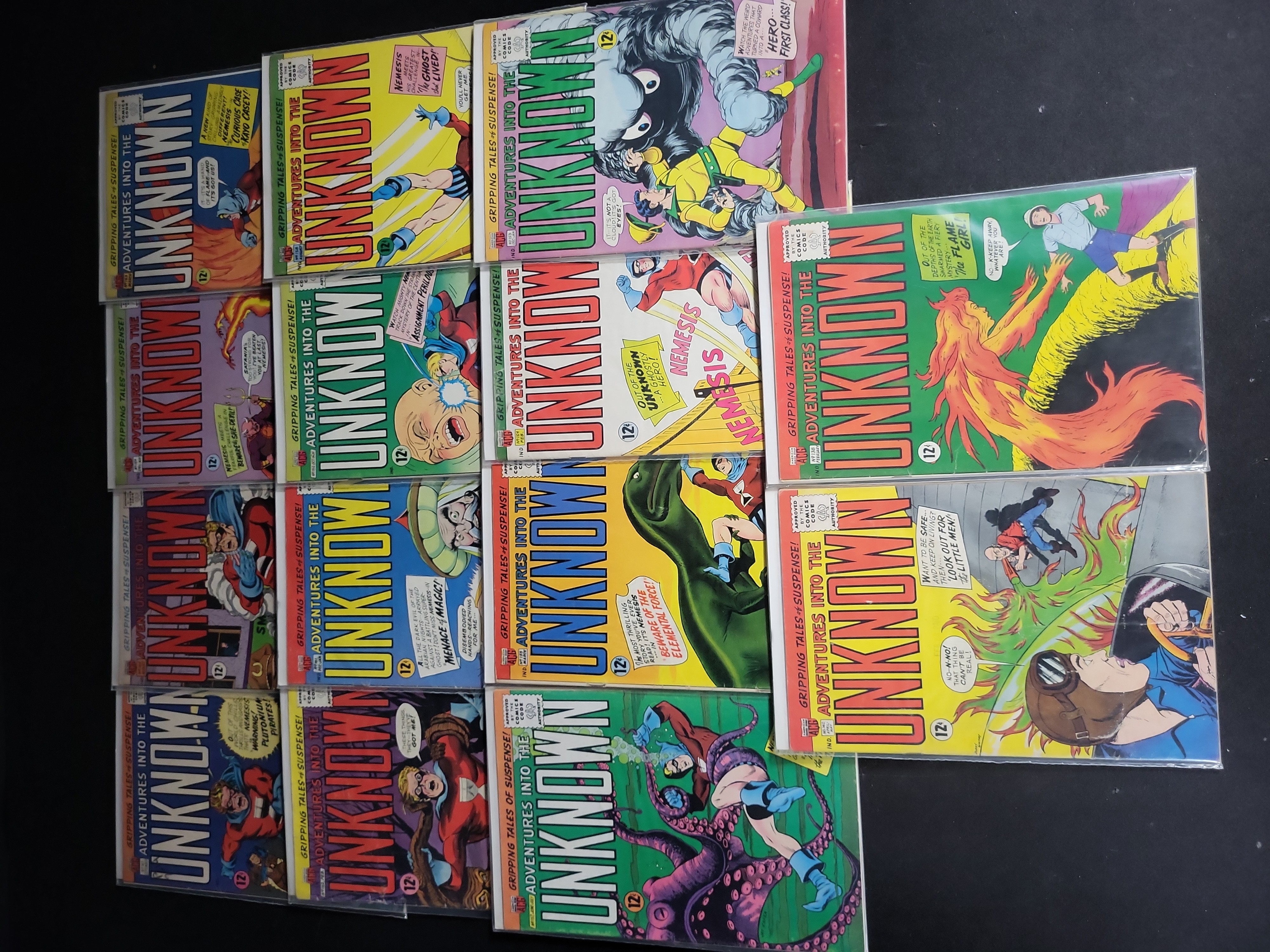 I04550 | Fourteen ACG Adventures Into The Unknown Comics