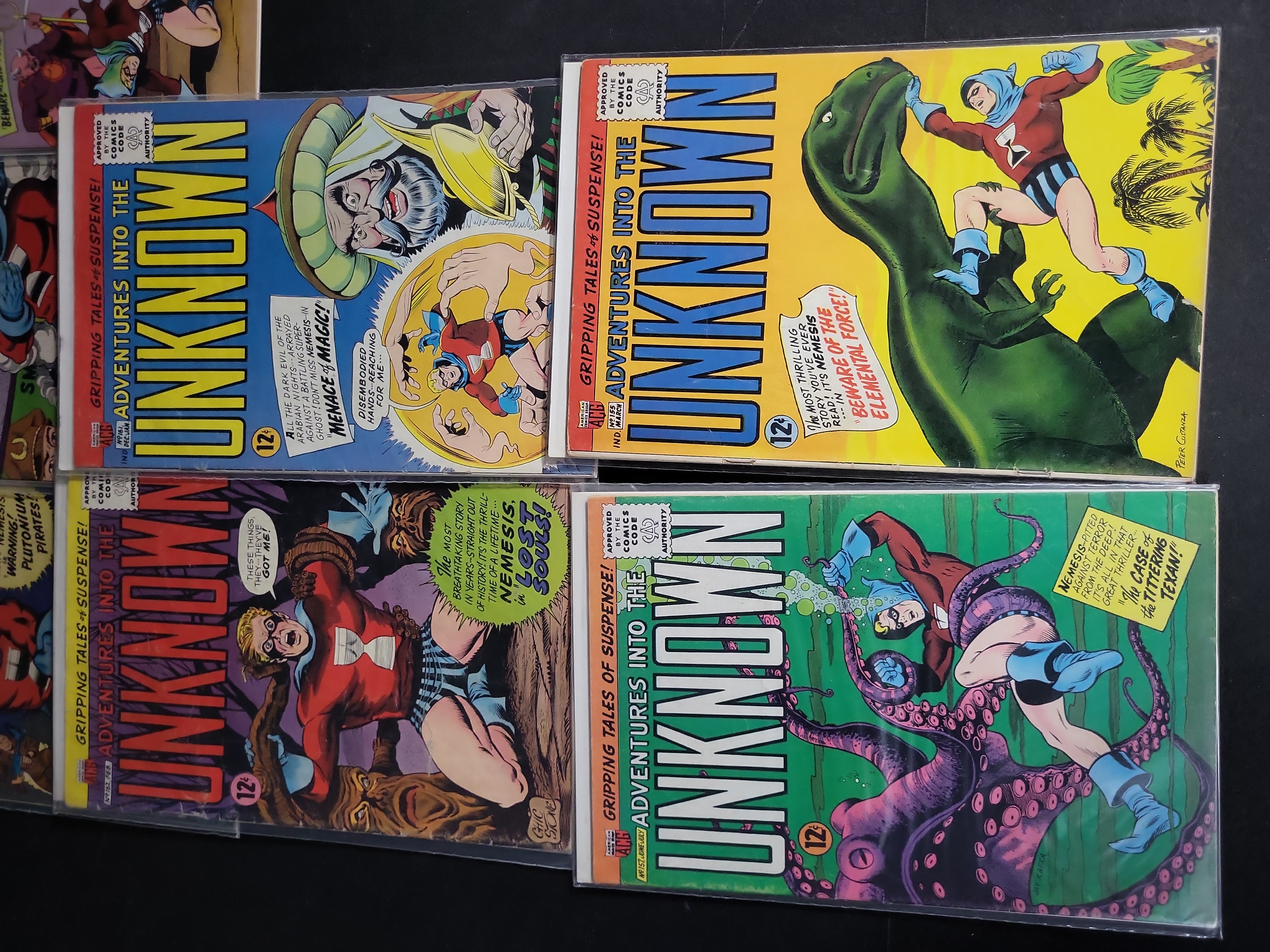 I04550 | Fourteen ACG Adventures Into The Unknown Comics