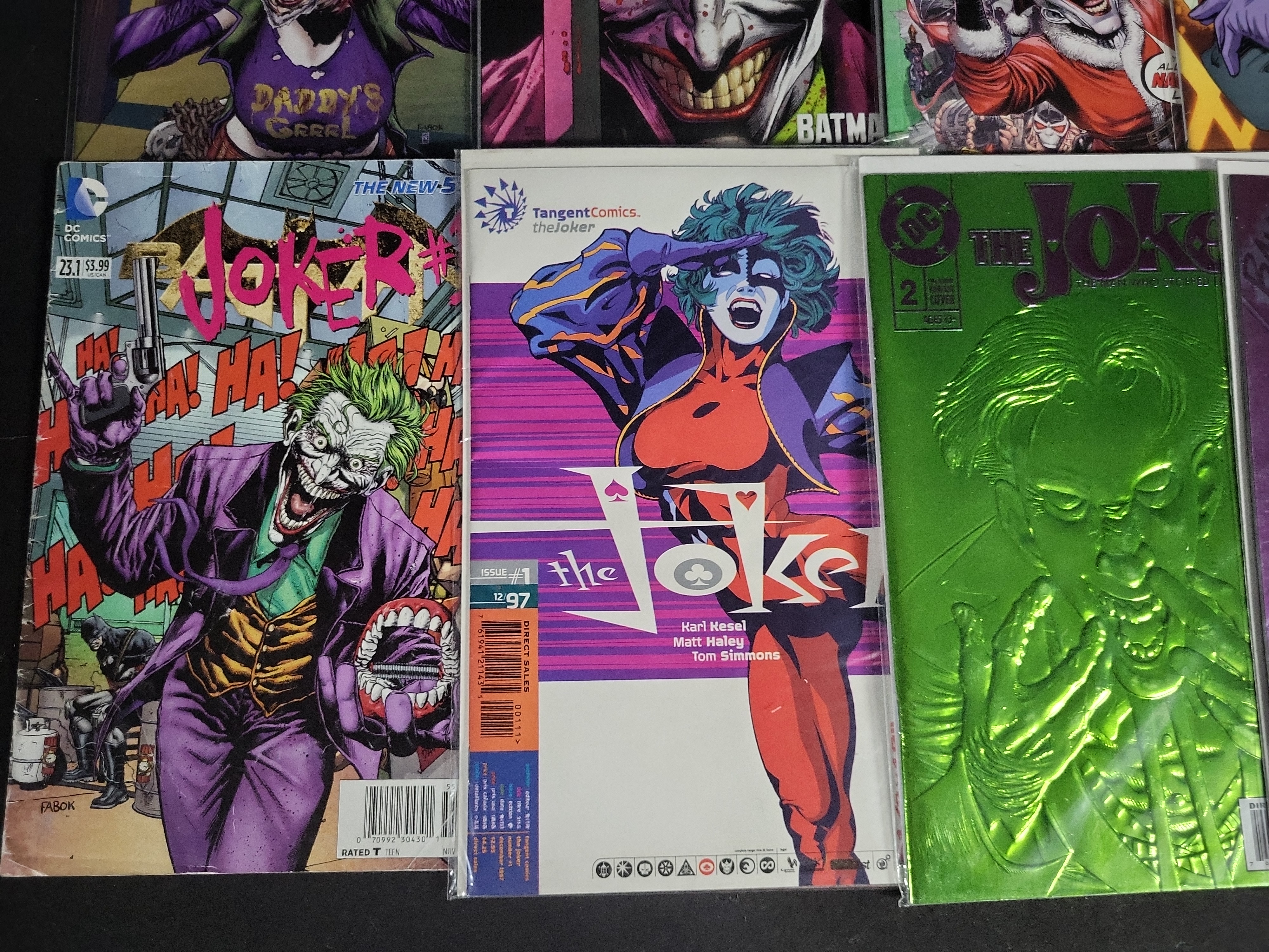 I04589 | Eight Joker DC Comic Books