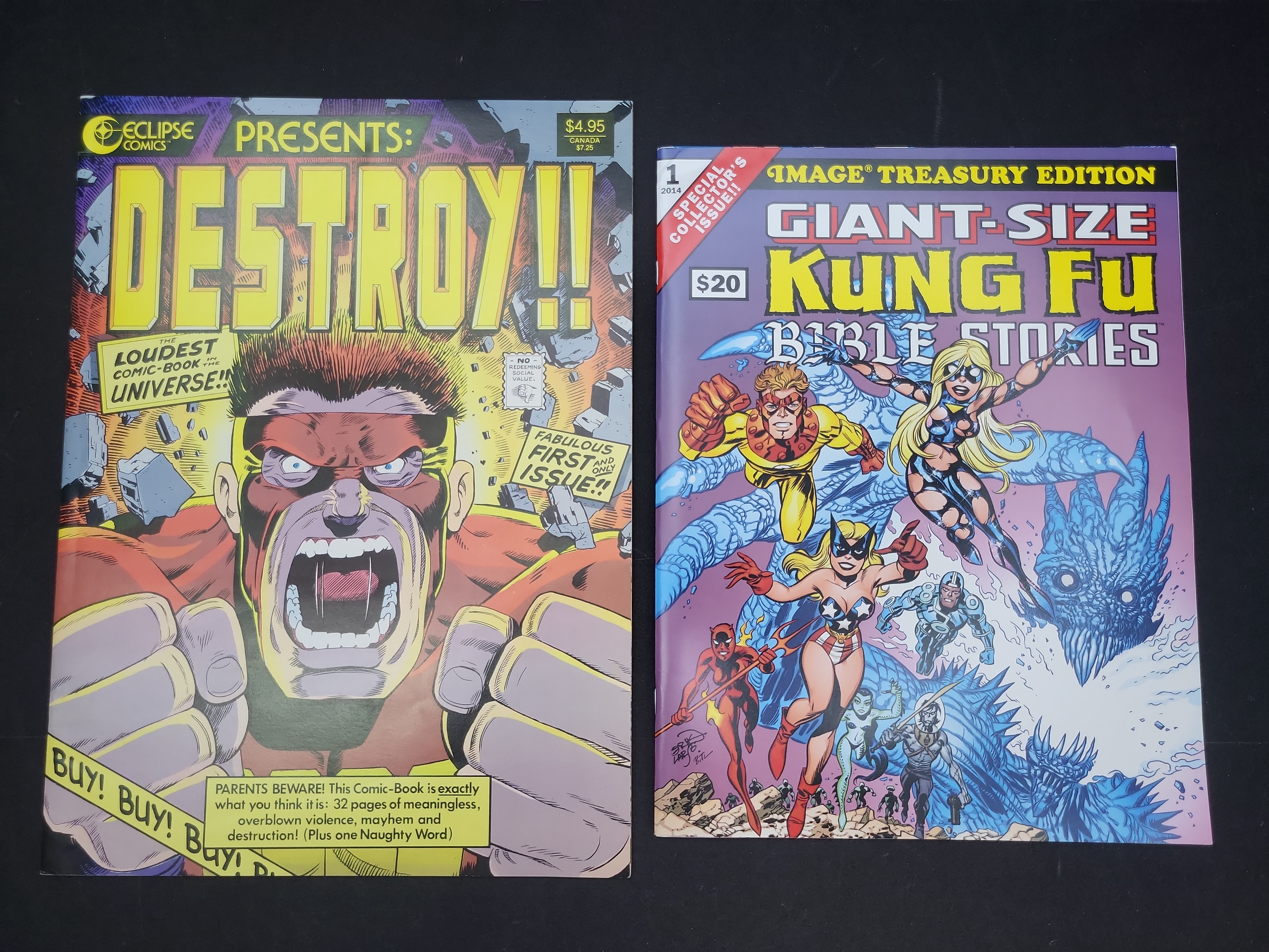 I03944 | Two Oversized Specialty Comic Books