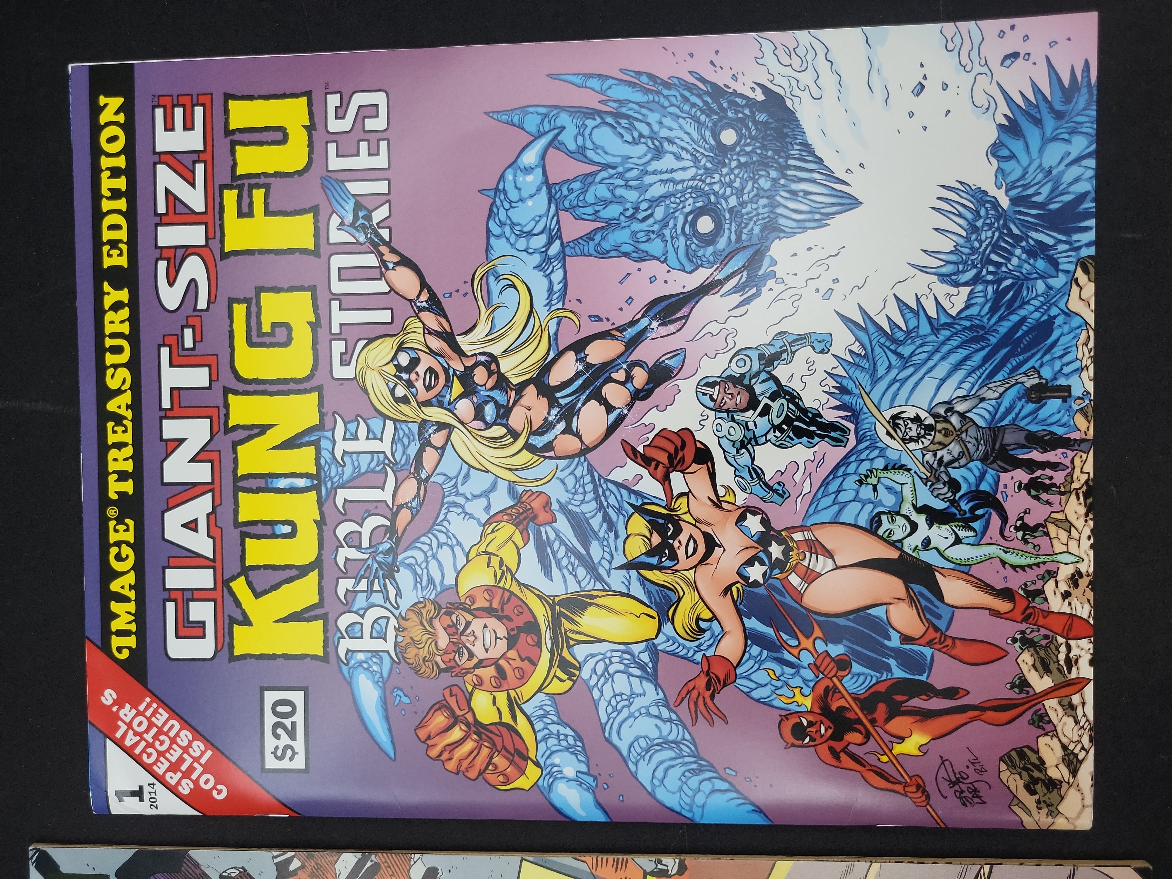 I03944 | Two Oversized Specialty Comic Books