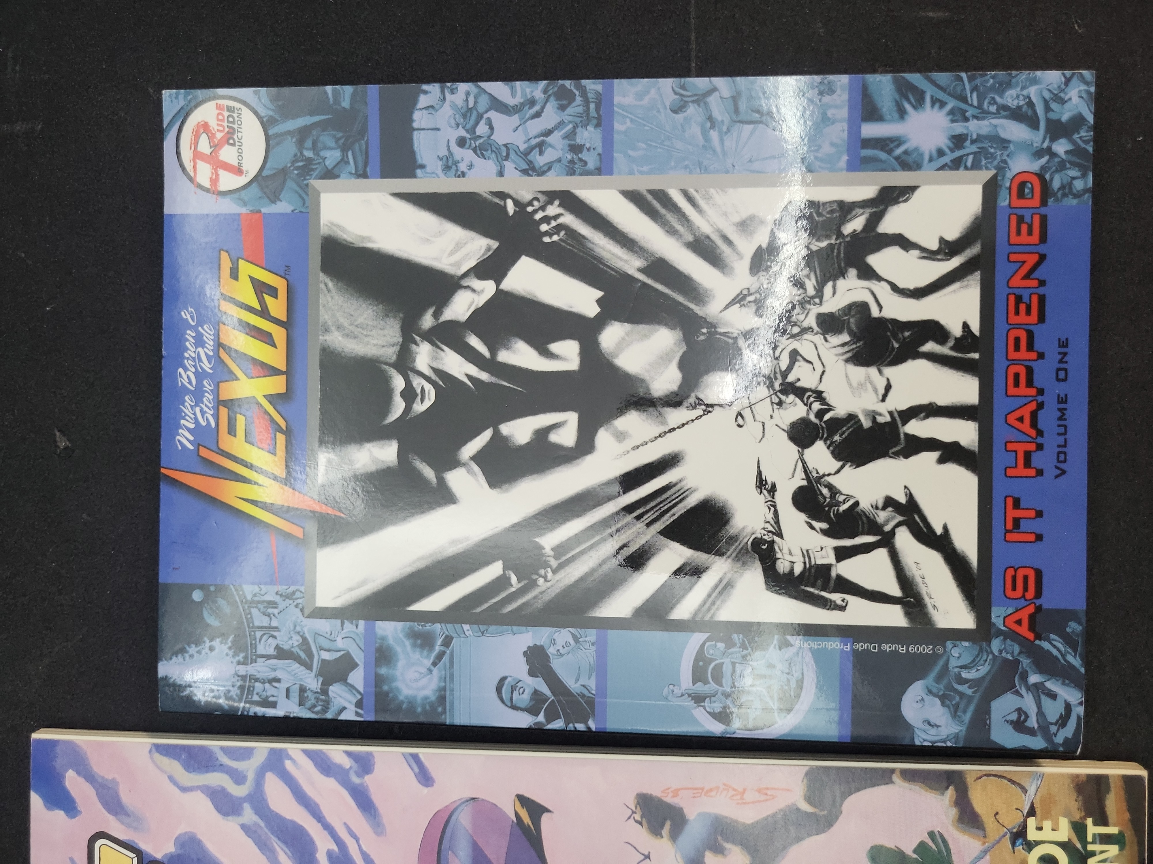 I03958 | Two Nexus Graphic Novel Collections