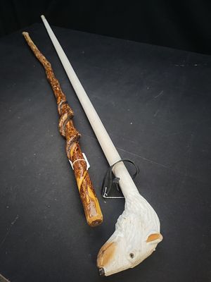 I04737 | Two Folk Art Walking Sticks. IMPORTANT – PLEASE REVIEW BEFORE BIDDING: Aeron House 