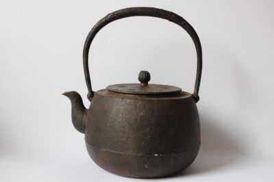Japanese Iron Teapot. 7 1/2" W 9" H Please note the absence of a condition report does not imply