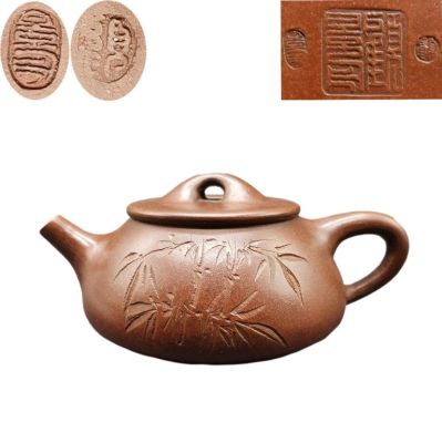 Chinese Zisha Teapot. 14.6cm L 9.1cm H Please note the absence of a condition report does not