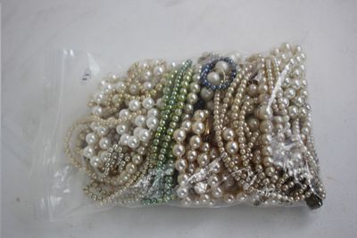 A large collection of pearl necklaces (not tested)