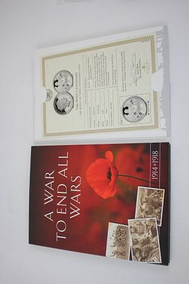 A War to End all Wars booklet containing 2 x CuNi coins