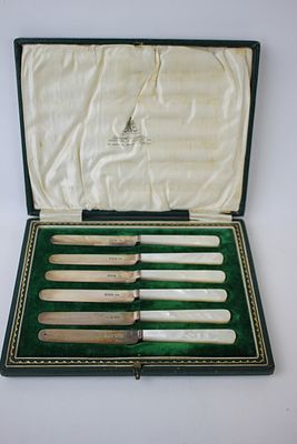 Six silver fruit knives in original box