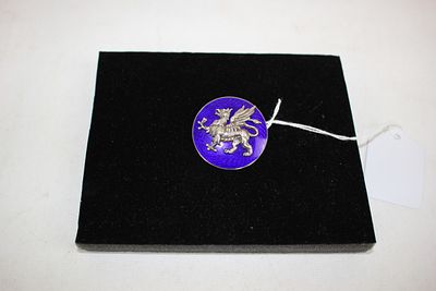 A Silver and Blue enamel brooch with a Welsh dragon (small chip to the enamel)