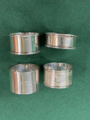 Four circular HM silver napkin rings Total weight c 102.36 gm