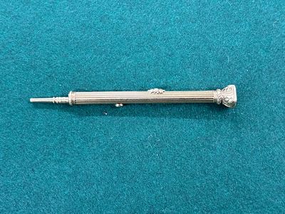 A Samson Mordan &amp; Co yellow metal propelling pencil with an agate shield to the top