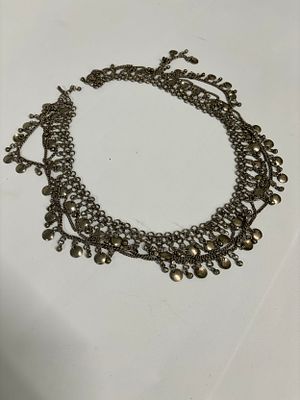 A white metal (probably from Rajastan) waist belt