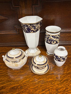 Wedgwood Cornucopia - Three vases, two lidded pots and saucer