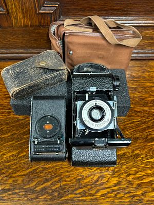 A Kershaw eight-20 King Penguin in case together with a Kodak V P Autographic special in 