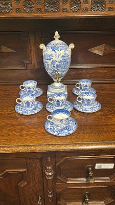 A Copeland blue &amp; white Samovar having historic repairs (staples) together with six cups 