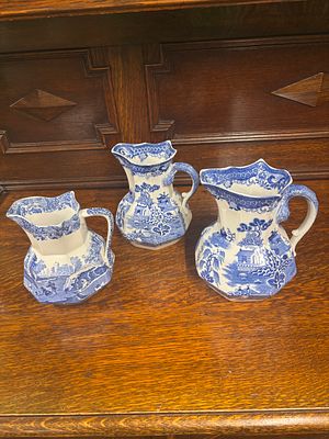 Three blue and white jugs, two Mason's and one Copeland