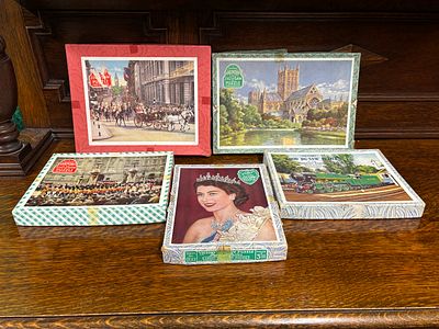 Five Victory wooden jigsaw puzzles in original boxes