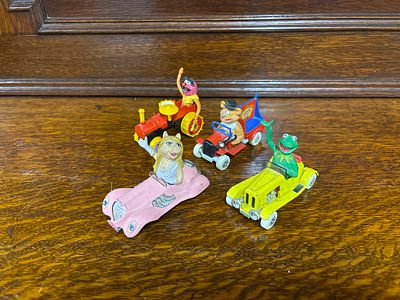 Four play warn Corgi cars featuring The Muppets, dated 1979 and Made in Great Britain. (Miss 