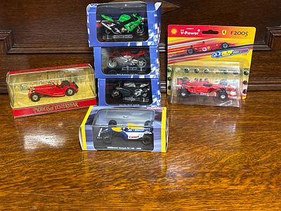 A quantity of model cars and motorcycles to include the 1992 Nigel Mansell, Williams F1 racing 