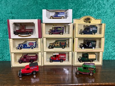 Twelve model vehicles, ten in original boxes