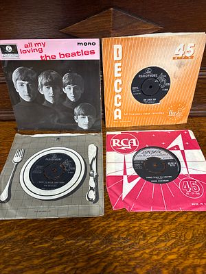Three Beatles singles and Eddie Cochrane - Three Steps to Heaven