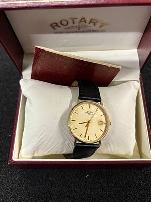 A yellow metal Rotary quartz wristwatch engraved K Cavanagh for 25 years service with BAe, in 