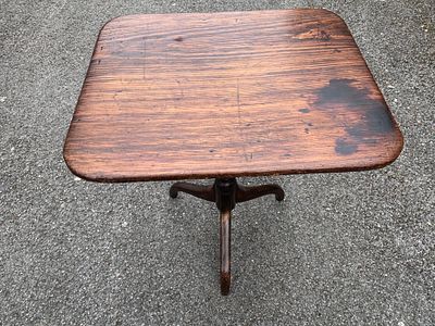 A 19th century stained frame rectangular table on pedestal and tripod legs. 59 cm wide