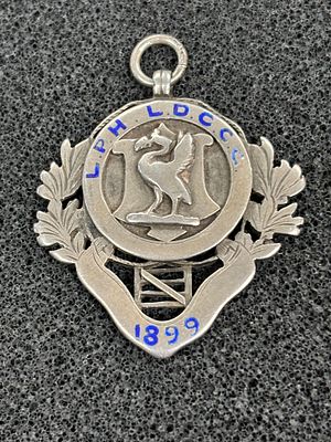 Liverpool interest, a HM silver fob featuring the Liver Bird and inscribed in Blue L.P.H 