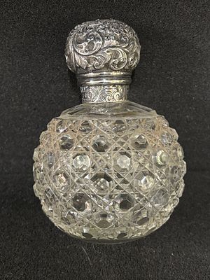 A HM Silver topped hob-nail glass scent bottle presented to Gertrude Bird in June 1898 for 