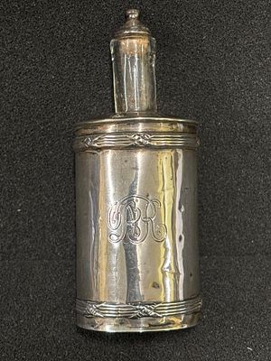 A HM Silver sleeved scent bottle
