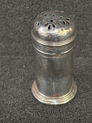 A H M silver pepperette weighing 17.04 gm