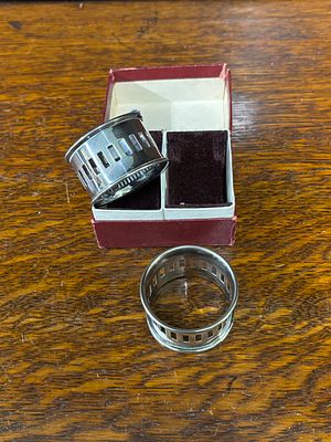 A pair of silver plated napkin rings