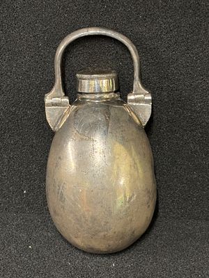 A Victorian white metal lady's muff warmer