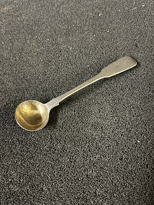 A HM silver mustard spoon weighing 12.57 gm