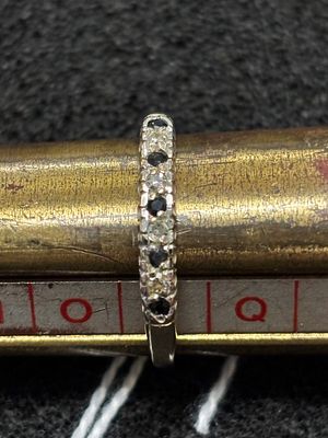 A 9 ct gold ring with sapphire &amp; diamonds weighing 1.68 gm