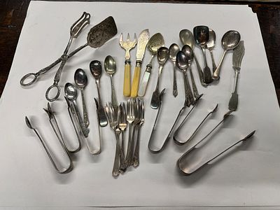 A mixed lot of silver plate which includes HM Silver tongs weighing 41.64 gm