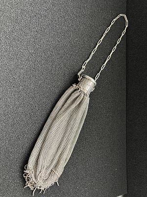 An early 20th Century white metal Alpaca mesh bag