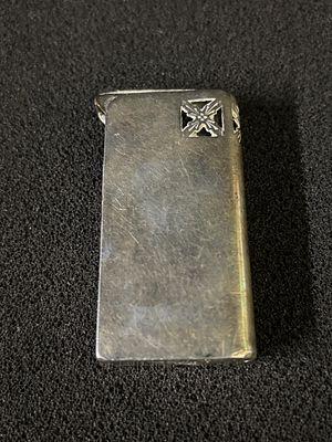 A vintage Sterling silver cigarette lighter