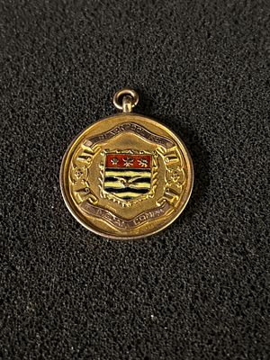 A 9 ct gold medal by Dance &amp; Duerden (Morley) presented to Blackpool F.C. as winners of the 