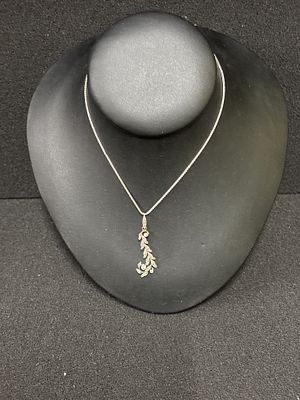 An 18ct White gold and diamond pendant on 18" chain