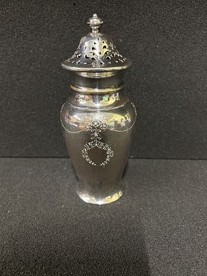 A silver plated sugar caster